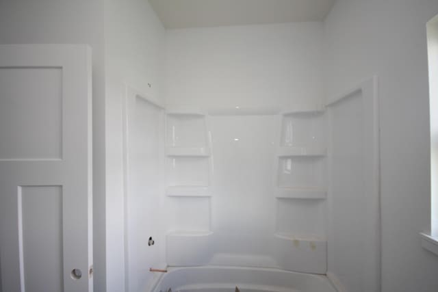 bathroom featuring bathing tub / shower combination
