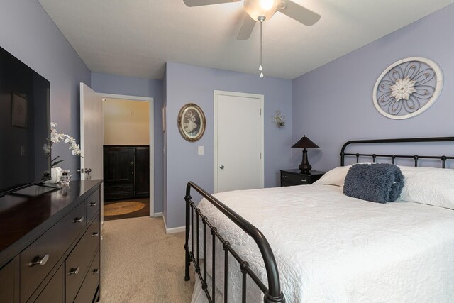 1730 N Pine St, Marshfield, MO 65706 - bedroom featuring light colored carpet, a ceiling fan, baseboards, and ensuite bathroom