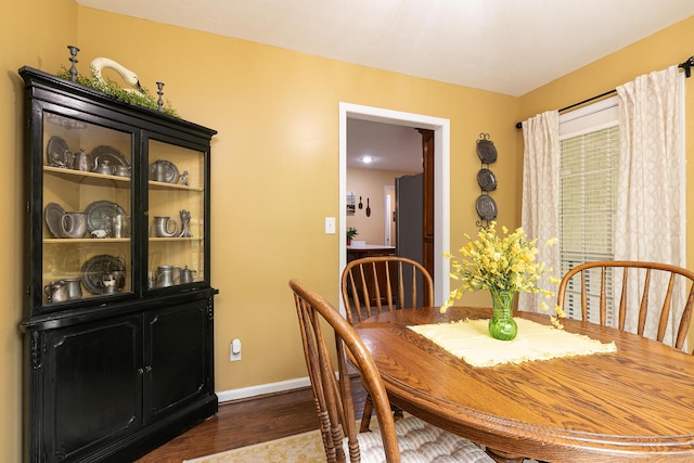 1730 N Pine St, Marshfield, MO 65706 - dining room featuring baseboards and wood finished floors