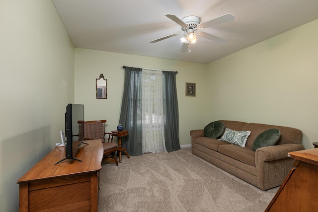 1730 N Pine St, Marshfield, MO 65706 - living area featuring light colored carpet, a ceiling fan, and baseboards