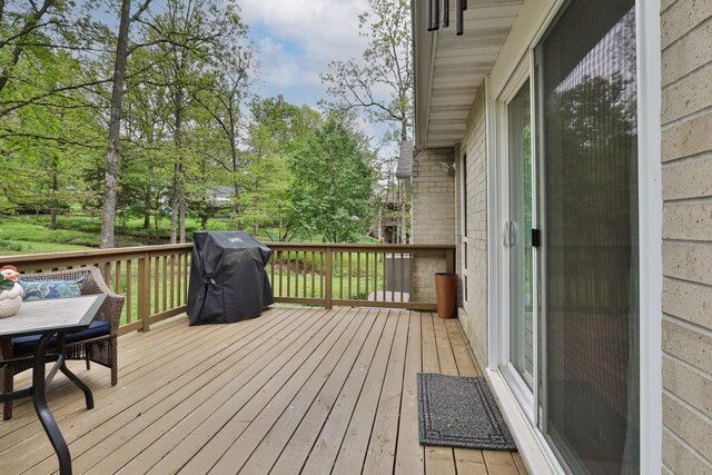 1730 N Pine St, Marshfield, MO 65706 - wooden terrace featuring outdoor dining area and grilling area
