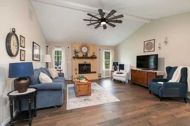 1730 N Pine St, Marshfield, MO 65706 - living area featuring vaulted ceiling with beams, dark wood-style flooring, ceiling fan, and a wealth of natural light