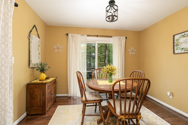1730 N Pine St, Marshfield, MO 65706 - dining area with baseboards and dark wood finished floors