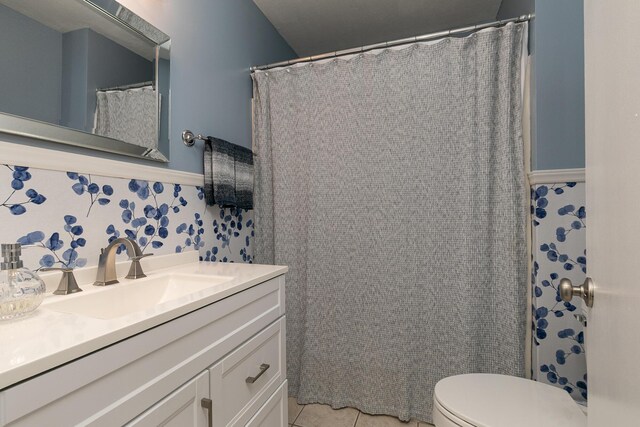 1730 N Pine St, Marshfield, MO 65706 - full bath featuring vanity, tile patterned flooring, and toilet