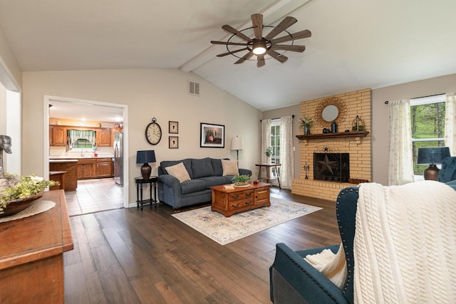 1730 N Pine St, Marshfield, MO 65706 - living room featuring a ceiling fan, visible vents, plenty of natural light, and dark wood finished floors