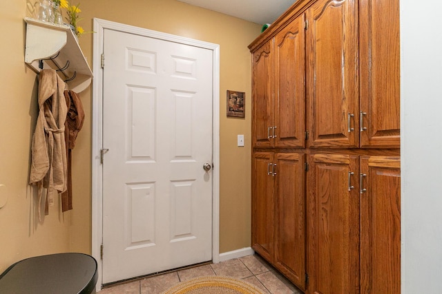 1730 N Pine St, Marshfield, MO 65706 - entryway with baseboards and light tile patterned floors