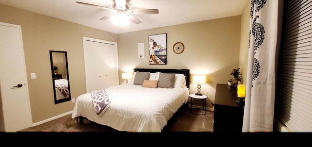 carpeted bedroom with baseboards, ceiling fan, and a closet