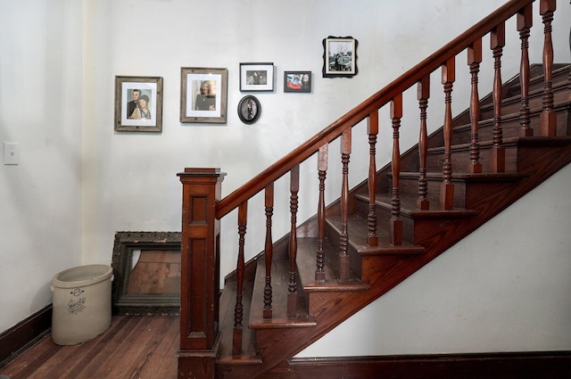 1487 E Lelia Ln, Springfield, MO 65803 - stairway featuring baseboards, wood finished floors, and a fireplace