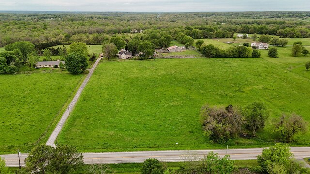 1487 E Lelia Ln, Springfield, MO 65803 - drone / aerial view with a wooded view and a rural view