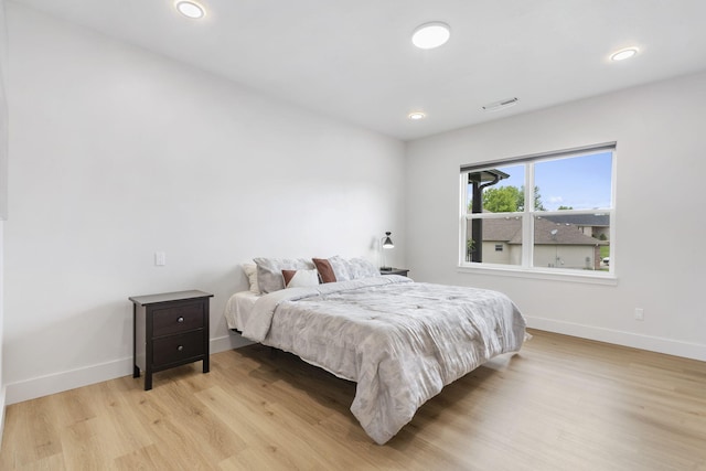 635 W Bridgewood Ct, Springfield, MO 65803 - bedroom with baseboards, light wood-style floors, and recessed lighting