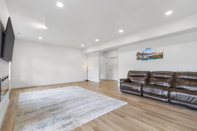 635 W Bridgewood Ct, Springfield, MO 65803 - living room with light wood-type flooring, recessed lighting, and baseboards