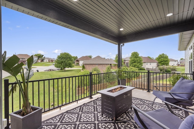 635 W Bridgewood Ct, Springfield, MO 65803 - balcony with a fire pit and a residential view