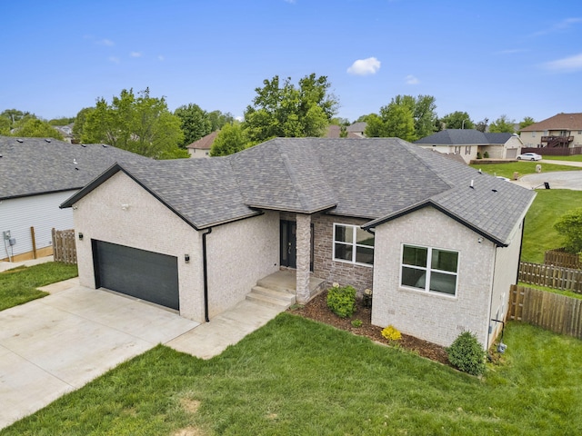 635 W Bridgewood Ct, Springfield, MO 65803 - view of front of house with an attached garage, roof with shingles, and concrete driveway