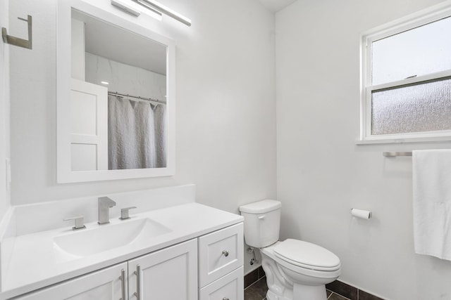635 W Bridgewood Ct, Springfield, MO 65803 - bathroom with toilet, vanity, baseboards, tile patterned flooring, and curtained shower