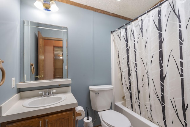 full bath featuring vanity, ornamental molding, shower / bath combination with curtain, toilet, and a textured ceiling