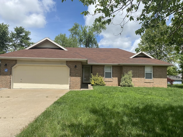 single story home with driveway, a front yard, a garage, brick siding, and a shingled roof