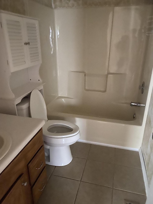 full bath with vanity, tile patterned flooring, toilet, and tub / shower combination