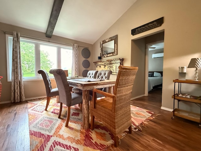 dining space featuring baseboards, vaulted ceiling, wood finished floors, and a wall mounted AC