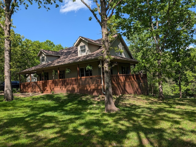 249 Mount Vernon Rd, Forsyth, MO 65653 - view of side of home featuring a porch and a lawn