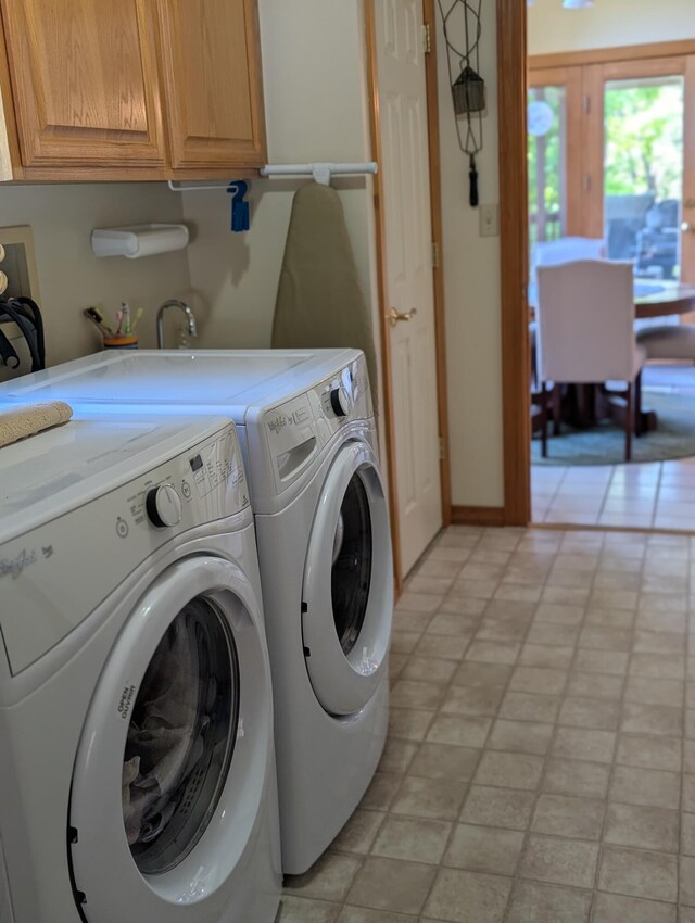 249 Mount Vernon Rd, Forsyth, MO 65653 - washroom with cabinet space and independent washer and dryer