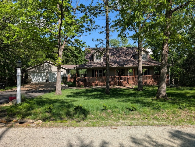 249 Mount Vernon Rd, Forsyth, MO 65653 - view of front of property with driveway, an outdoor structure, a front yard, and a garage