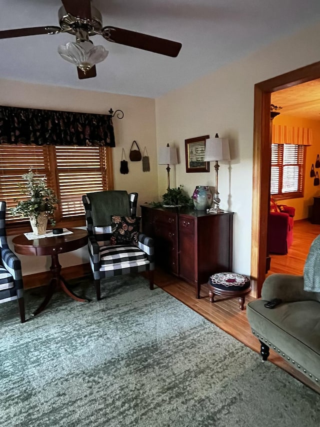 249 Mount Vernon Rd, Forsyth, MO 65653 - sitting room featuring ceiling fan and wood finished floors