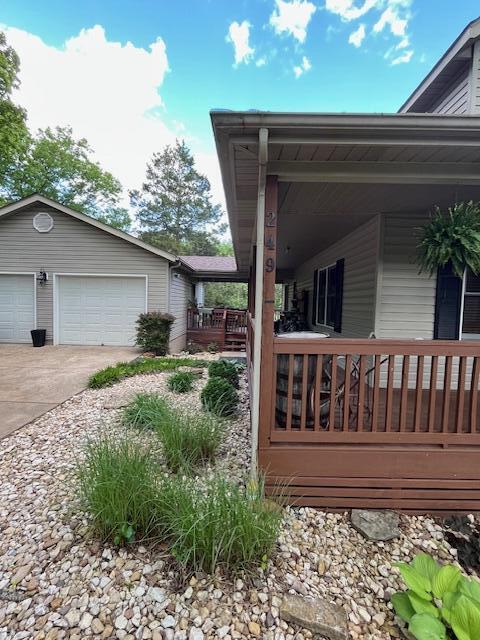 249 Mount Vernon Rd, Forsyth, MO 65653 - view of home's exterior with a porch and driveway