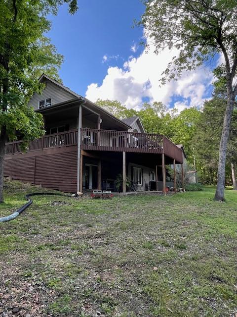 249 Mount Vernon Rd, Forsyth, MO 65653 - back of house with a lawn and a wooden deck