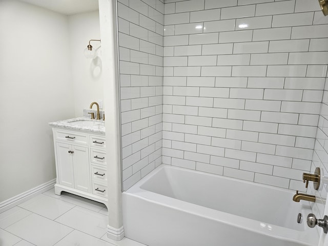 full bath featuring baseboards, tub / shower combination, tile patterned floors, and vanity