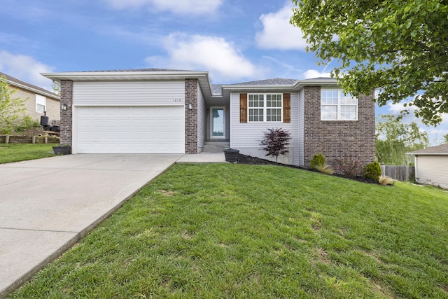 ranch-style house with a garage, a front lawn, and brick siding