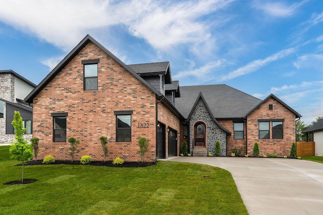 1822 E Cobblestone Dr, Ozark, MO 65721 - tudor-style house with driveway, brick siding, a front yard, and a shingled roof