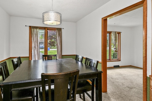 view of carpeted dining room