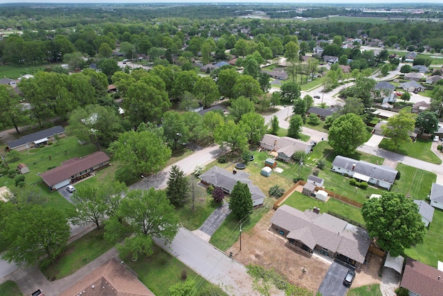 birds eye view of property with a residential view