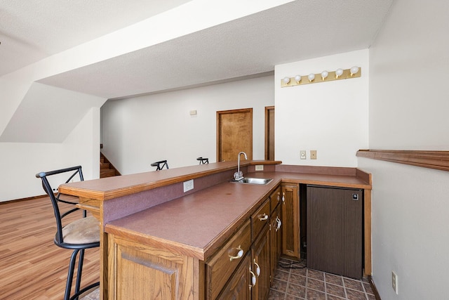 bar with a sink and stairway