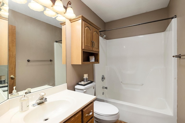 full bath with toilet, washtub / shower combination, and vanity