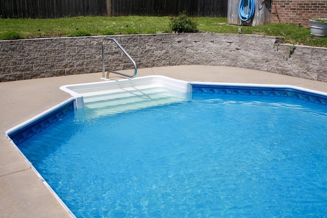 view of pool featuring fence and a fenced in pool
