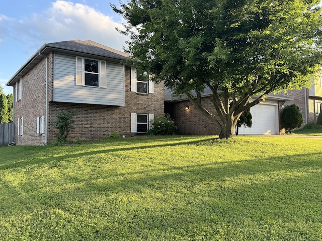 3934 W Lark St, Springfield, MO 65810 - view of front facade featuring brick siding, a front yard, and a garage