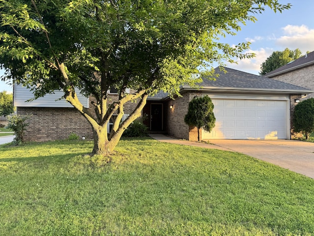 3934 W Lark St, Springfield, MO 65810 - view of front of home featuring a garage, a front lawn, concrete driveway, brick siding, and a shingled roof