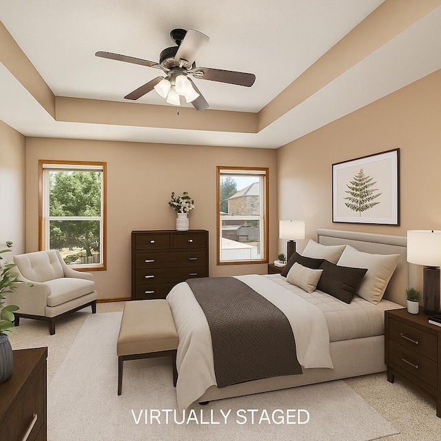 3934 W Lark St, Springfield, MO 65810 - bedroom with a tray ceiling, light colored carpet, and a ceiling fan