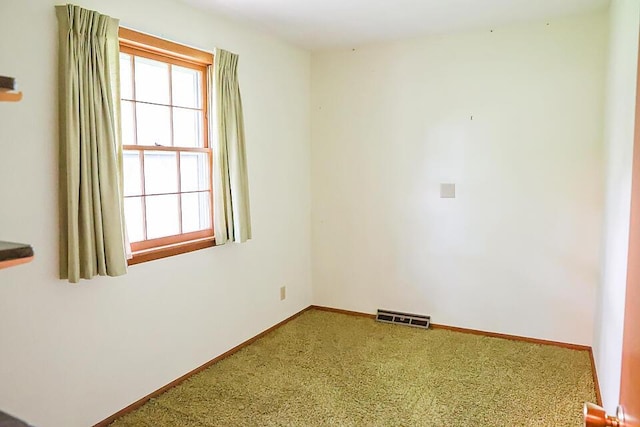 706 W Katella Ct, Springfield, MO 65807 - spare room featuring visible vents, carpet flooring, and baseboards