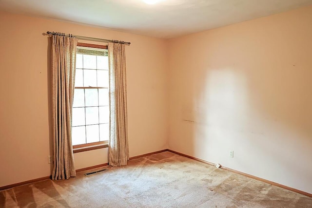 706 W Katella Ct, Springfield, MO 65807 - carpeted spare room with baseboards and visible vents