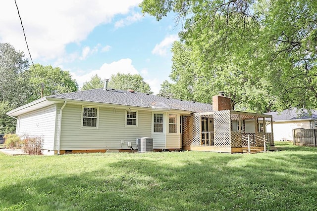 706 W Katella Ct, Springfield, MO 65807 - rear view of property with a lawn, central AC unit, a chimney, and crawl space