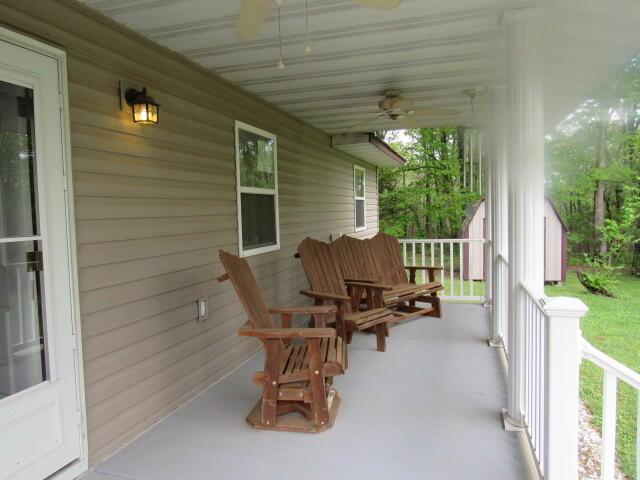 7210 Newkirk Rd, Mountain Grove, MO 65711 - exterior space with covered porch and ceiling fan