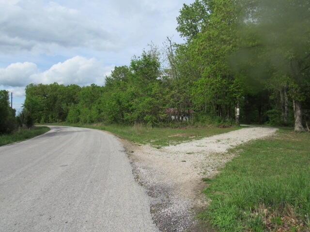 7210 Newkirk Rd, Mountain Grove, MO 65711 - view of road featuring a view of trees