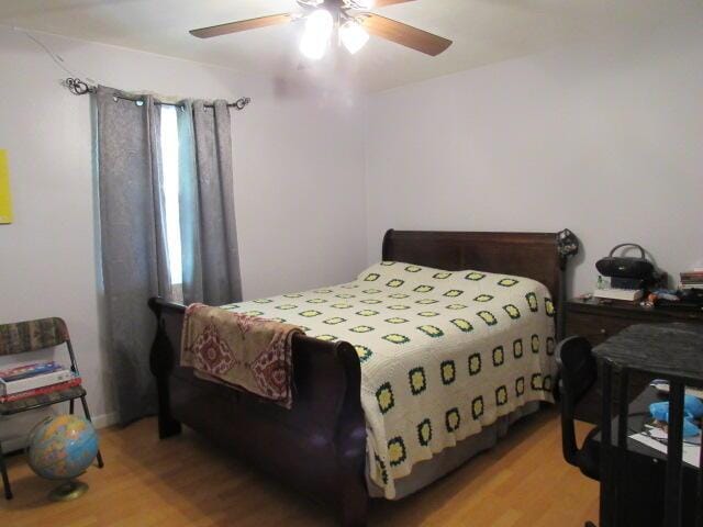 7210 Newkirk Rd, Mountain Grove, MO 65711 - bedroom with a ceiling fan and light wood finished floors