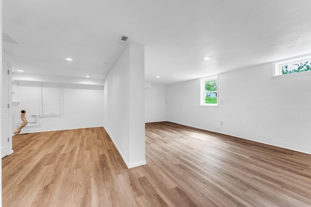 1107 E Mccracken Rd, Ozark, MO 65721 - basement with recessed lighting, light wood-type flooring, visible vents, and concrete block wall