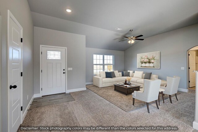 1213 Abercorn St, Republic, MO 65738 - living area with ceiling fan, arched walkways, baseboards, lofted ceiling, and carpet