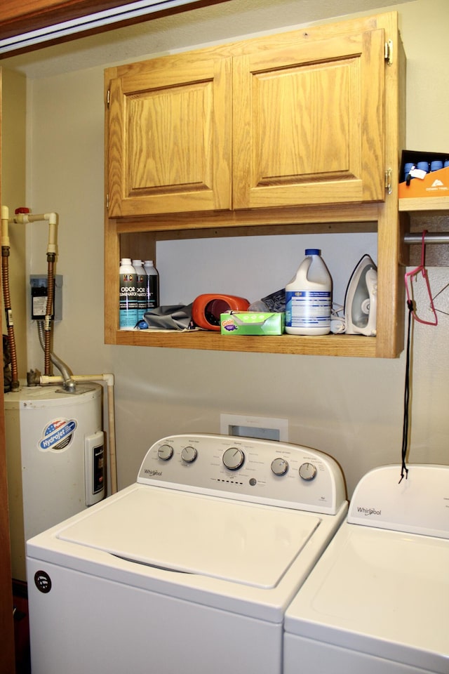 112 S Winfield, Joplin, MO 64801 - clothes washing area with washing machine and dryer and cabinet space