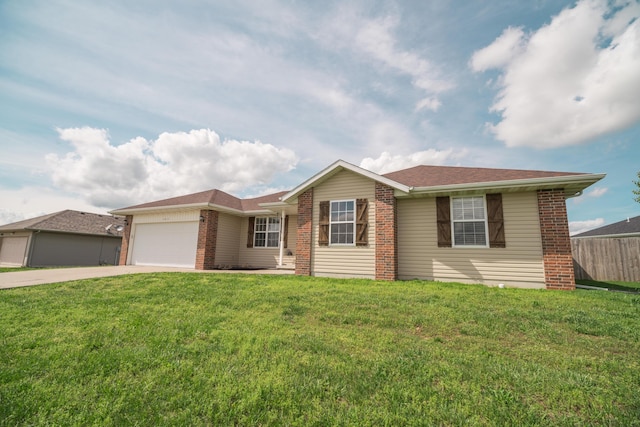 ranch-style home featuring an attached garage, concrete driveway, a front lawn, and brick siding