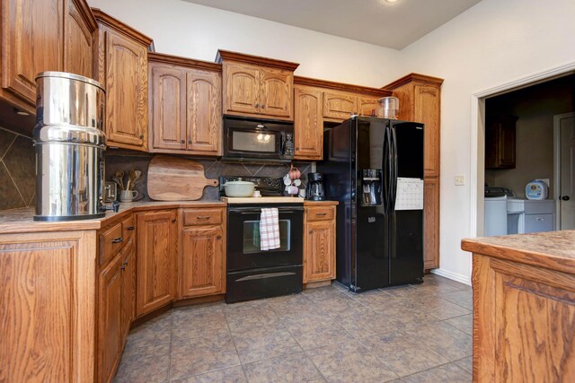 1376 N 14th St, Ozark, MO 65721 - kitchen with light countertops, brown cabinetry, black appliances, and tasteful backsplash